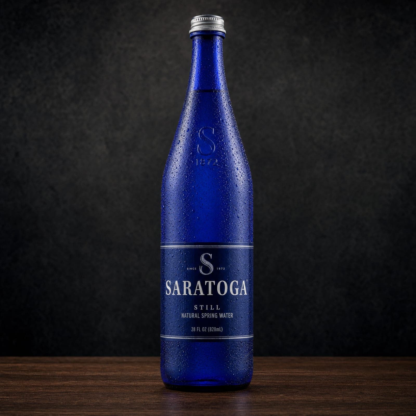 Saratoga, a blue glass bottle of Saratoga still spring water